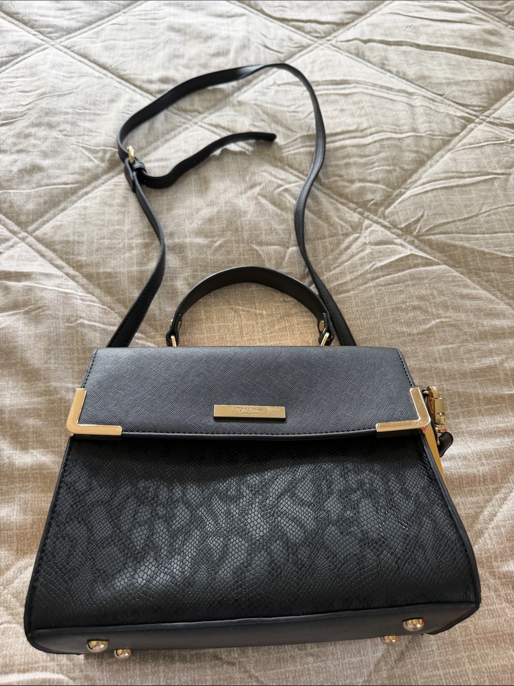 Elegant Black Satchel with Gold Accents